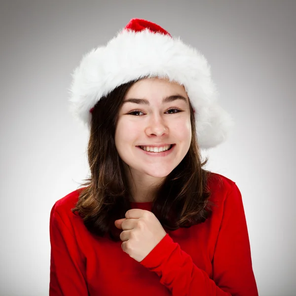 Ritratto di bella ragazza che indossa il cappello di Babbo Natale — Foto Stock
