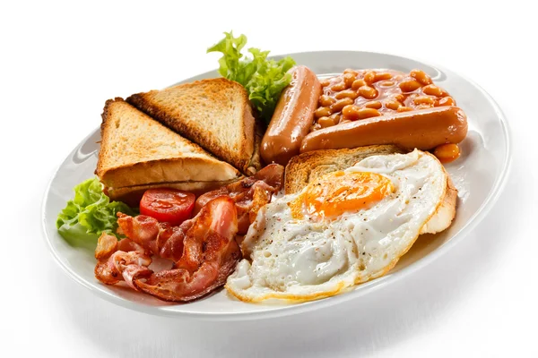 Engelsk frukost - toast, ägg, bacon och grönsaker — Stockfoto