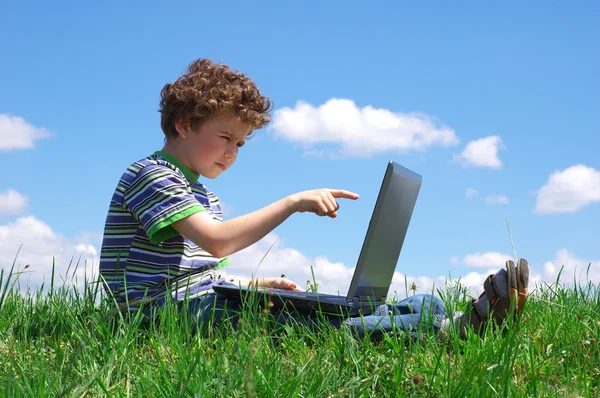 Boy with laptop Stock Photo