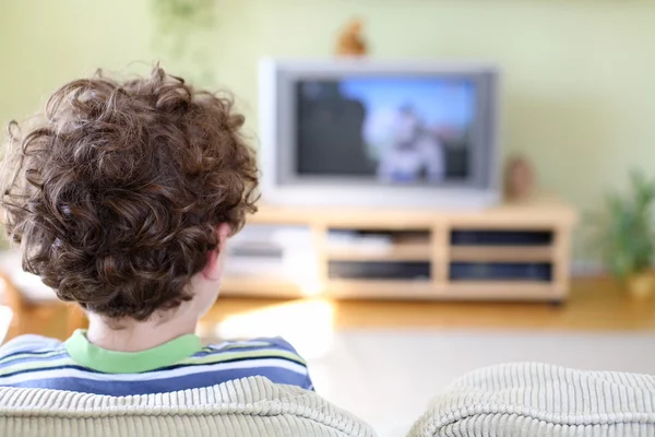 Boy watching television — Stock Photo, Image
