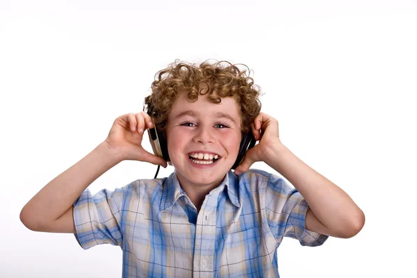 Menino ouvindo música — Fotografia de Stock