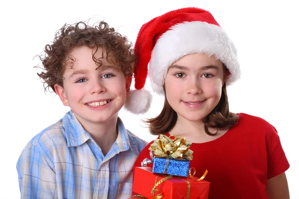 Boy and girl in Santa's Hat — Stock Photo, Image