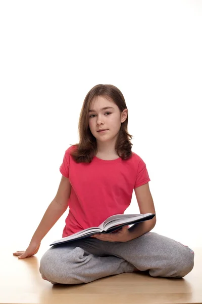 Girl reading a book — Stock Photo, Image