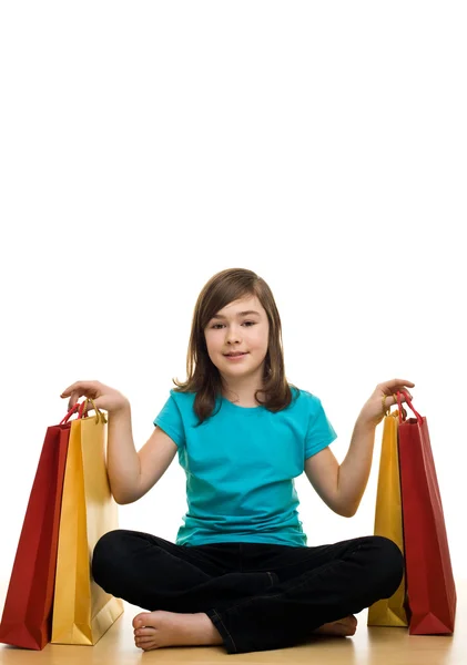 Belle fille avec des sacs à provisions — Photo