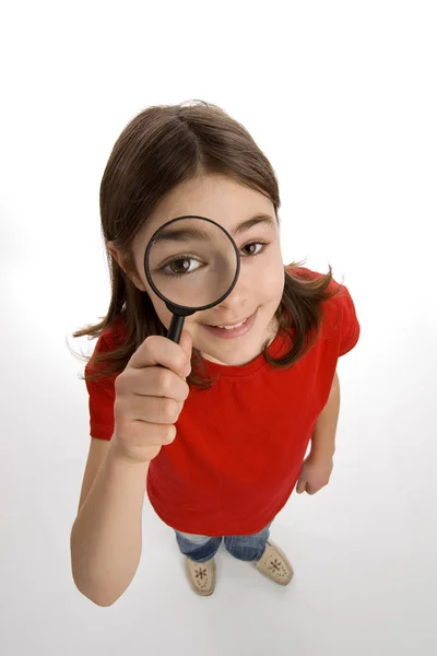 女の子ホールディング虫眼鏡 — ストック写真
