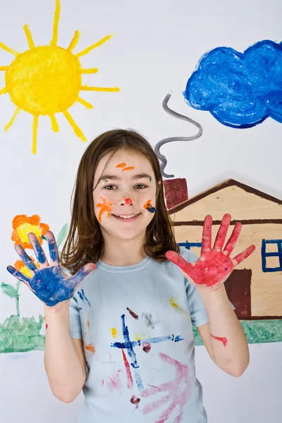 Menina pintura na parede — Fotografia de Stock