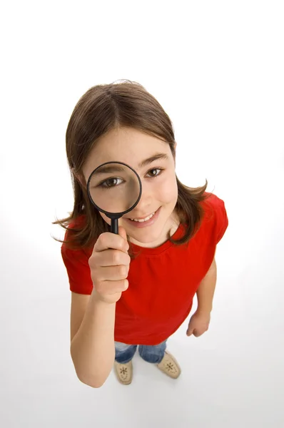 女の子ホールディング虫眼鏡 — ストック写真