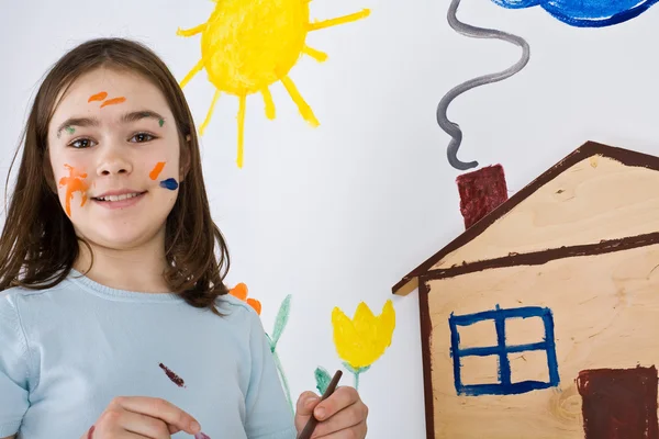 Menina pintura na parede — Fotografia de Stock