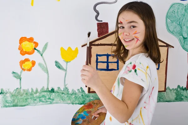 Menina pintura na parede — Fotografia de Stock