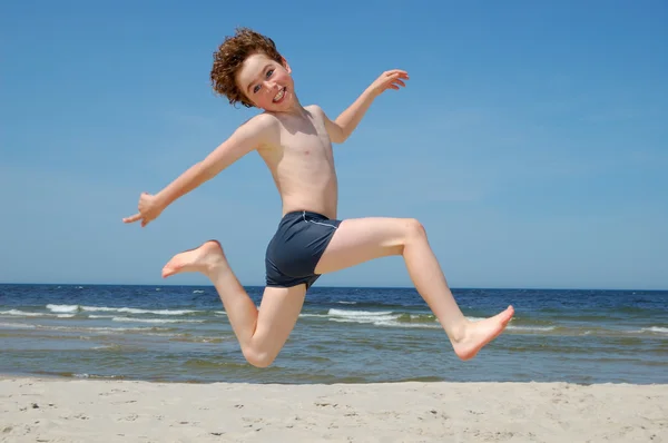 Boy jumping Stock Photo