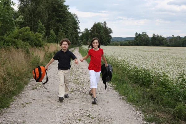 Young kids going to school — Stock Photo, Image