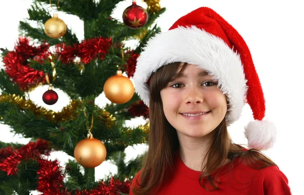 Молодая девушка Санта украшать елку — стоковое фото