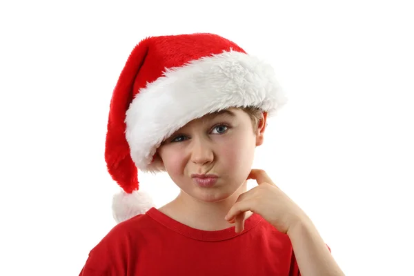Продуманий молодий хлопчик, як Санта-Клаус — стокове фото