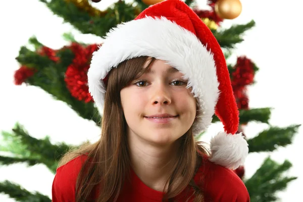 Young girl Santa decorating Christmas tree — Stock Photo, Image