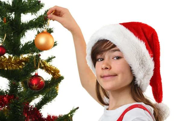 Jovem menina Santa decoração árvore de Natal — Fotografia de Stock