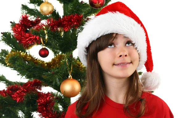 若い女の子サンタ飾るクリスマス ツリー — ストック写真