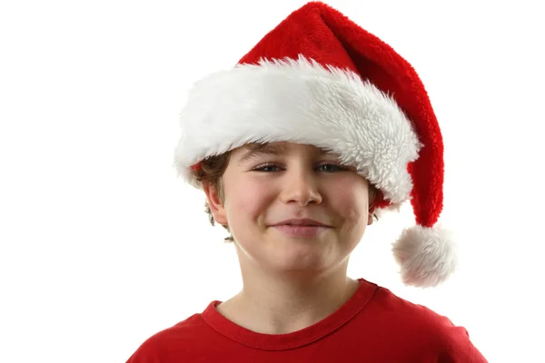 年轻的男孩成圣诞老人的样子 图库图片