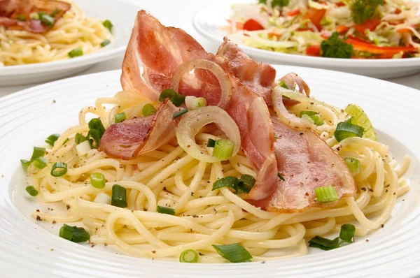 Pasta with bacon and chives — Stock Photo, Image