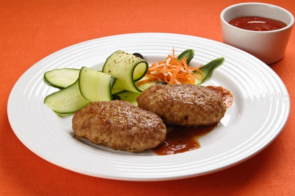 Fried chop pork, chips and vegetable salad — Stock Photo, Image