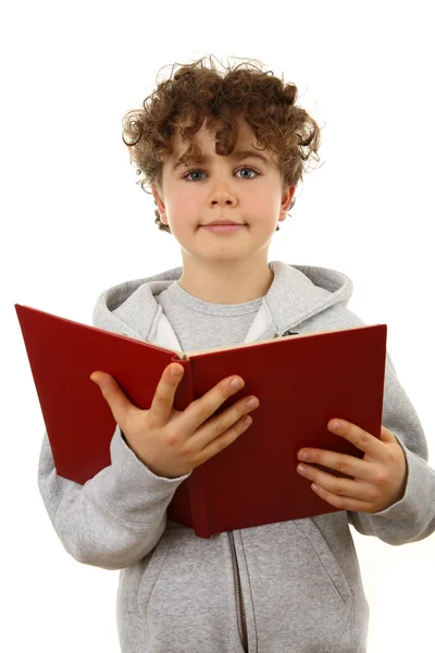 Мальчик держит книги — стоковое фото