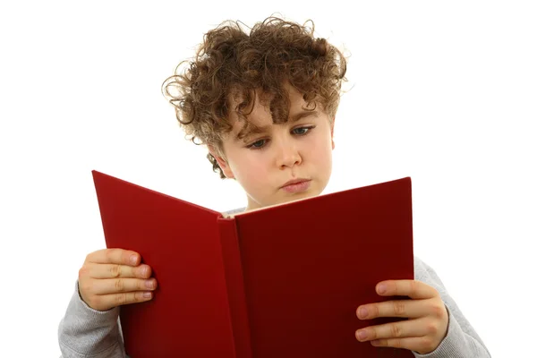 Jovem menino segurando livros — Fotografia de Stock