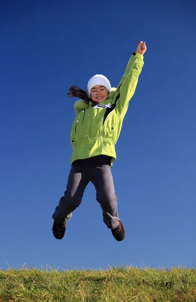 Beautiful girl jumping outdoor — Stock Photo, Image