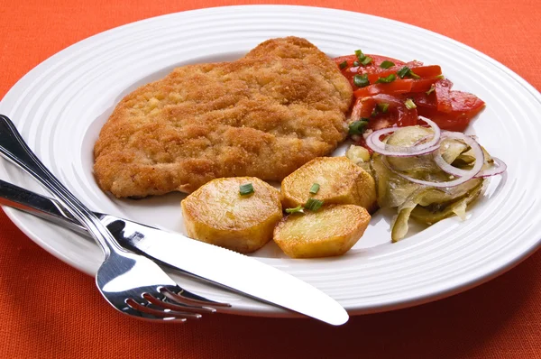 Fried chop pork with potatoes and vegetable salad — Stock Photo, Image