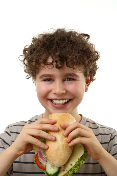 男孩吃三明治 — 图库照片