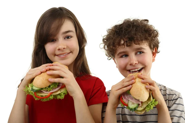 Kids eating healthy sandwiches — Stock Photo, Image