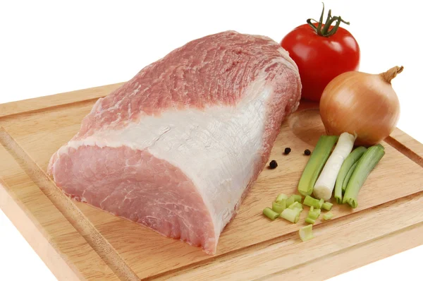 Raw pork on cutting board — Stock Photo, Image