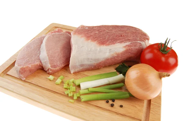 Raw pork on cutting board — Stock Photo, Image