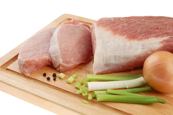 Raw pork on cutting board — Stock Photo, Image