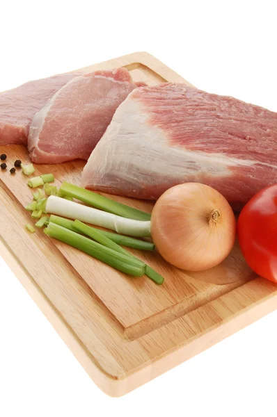 Raw pork on cutting board — Stock Photo, Image