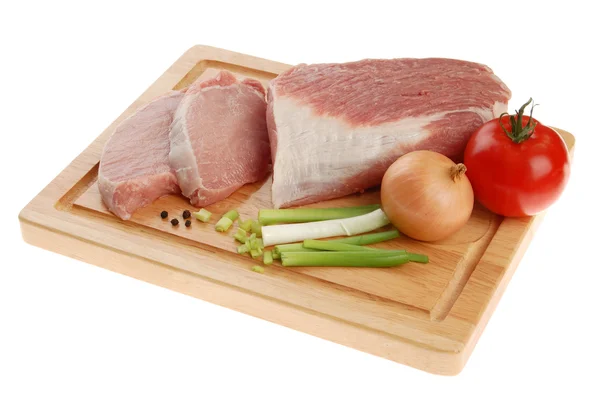 Cerdo crudo en tabla de cortar —  Fotos de Stock