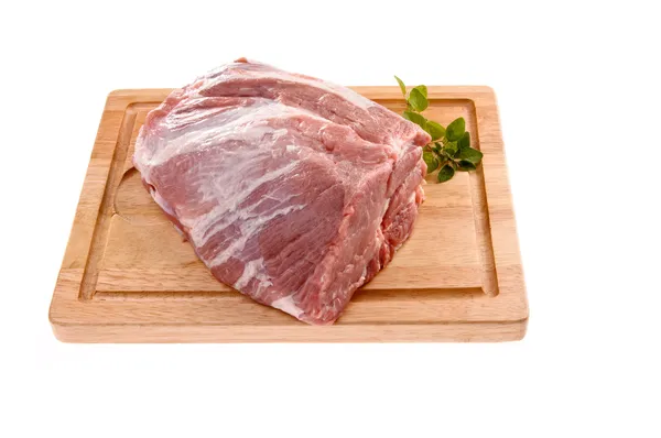 Raw pork on cutting board Stock Picture