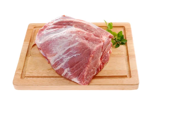 Raw pork on cutting board Stock Photo