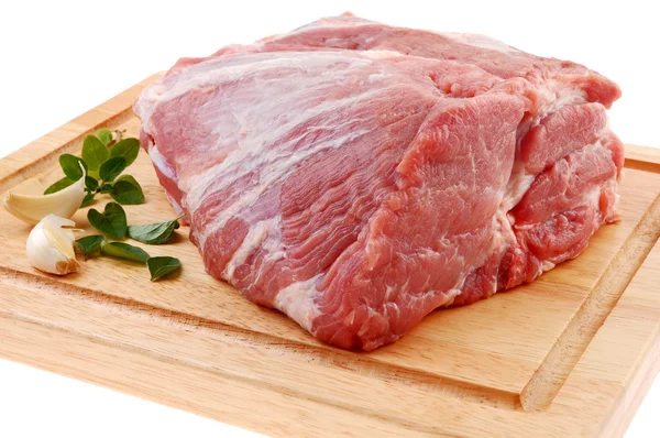 Raw pork on cutting board Royalty Free Stock Images