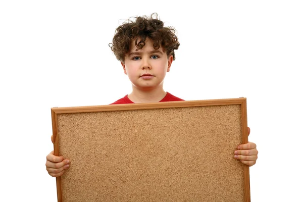 Niño sosteniendo tablón de anuncios — Foto de Stock