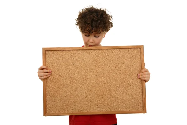 Boy holding noticeboard — Stock Photo, Image