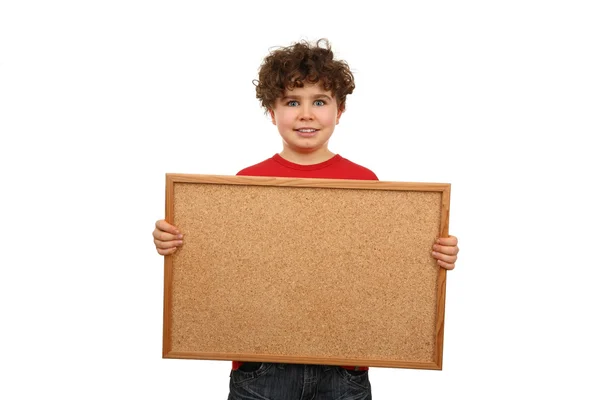Мальчик держит доску объявлений — стоковое фото