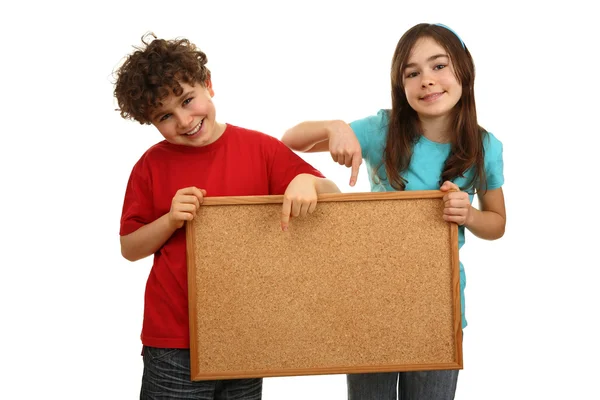 Kids holding noticeboard — Stock Photo, Image