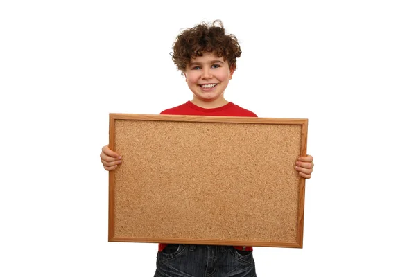 Niño sosteniendo tablón de anuncios —  Fotos de Stock