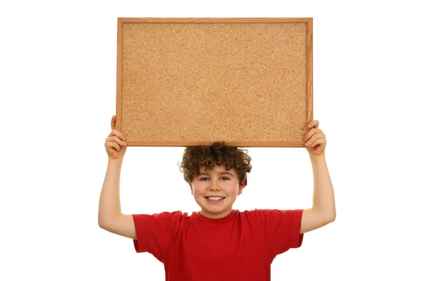 Boy holding noticeboard — Stock Photo, Image