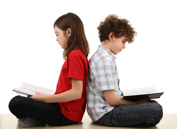 Girl and boy reading books — Stock Photo, Image