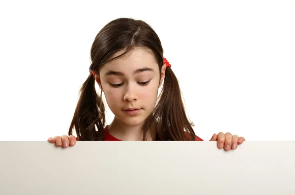Beautiful girl holding empty board — Stock Photo, Image