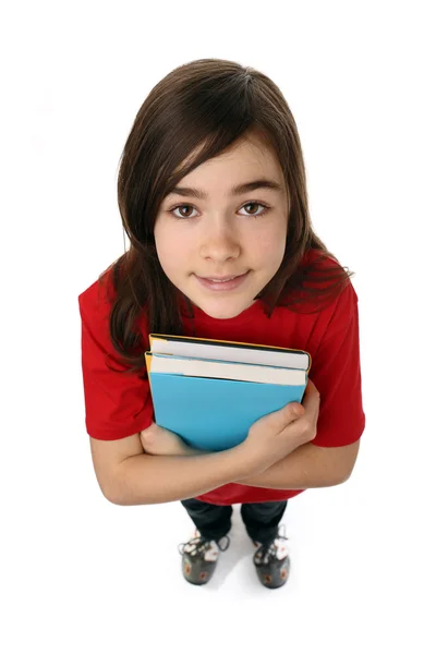 Menina segurando livros — Fotografia de Stock