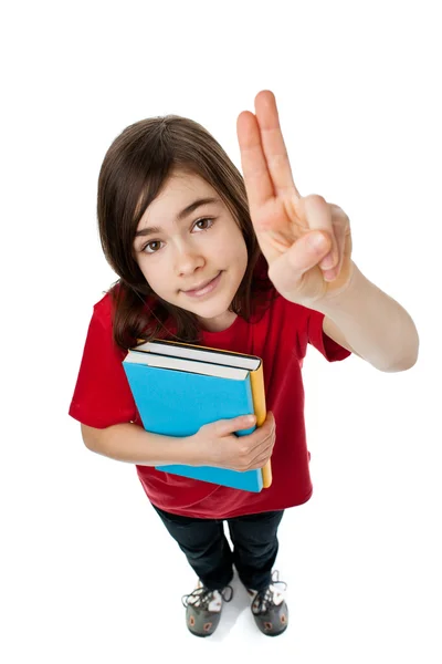 Menina segurando livros — Fotografia de Stock