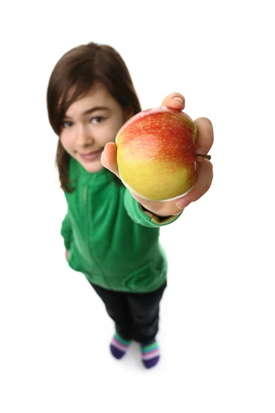 Mädchen hält Apfel — Stockfoto