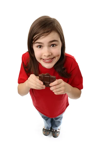 Girl eating bar of chocolate — Stock Photo, Image