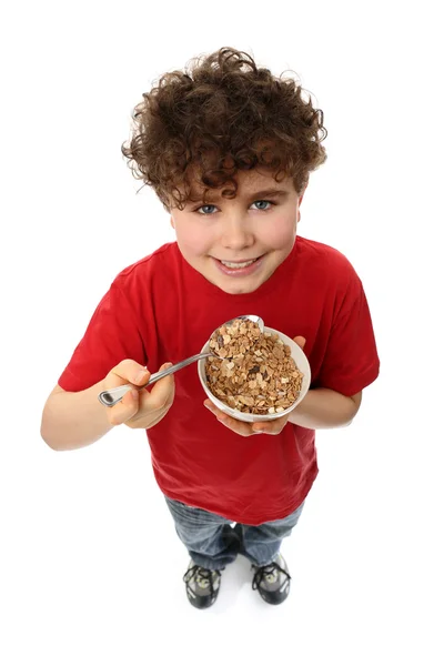 Junge hält Müsli in der Hand — Stockfoto